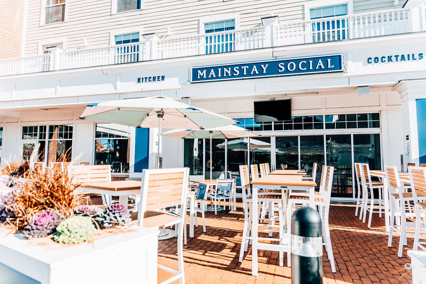 Mainstay Social outdoor patio and fire towers at Salem Waterfront Hotel
